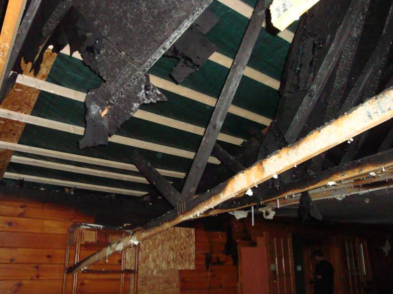 wooster fire boarded up and tarped interior pic